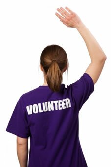 Woman with a Volunteer shirt.